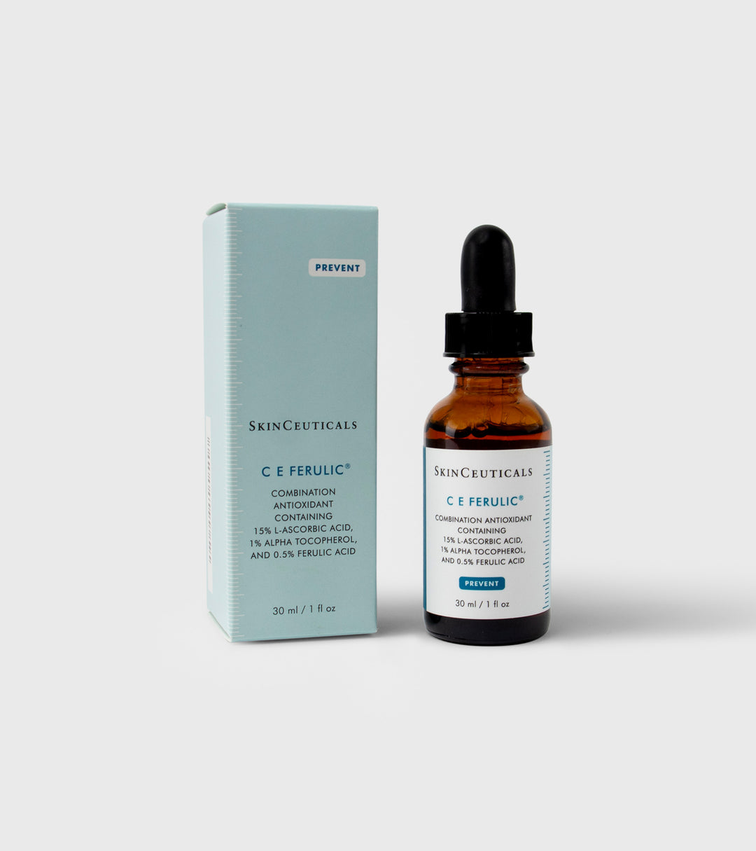 A bottle of SkinCeuticals C E Ferulic serum next to its packaging box.